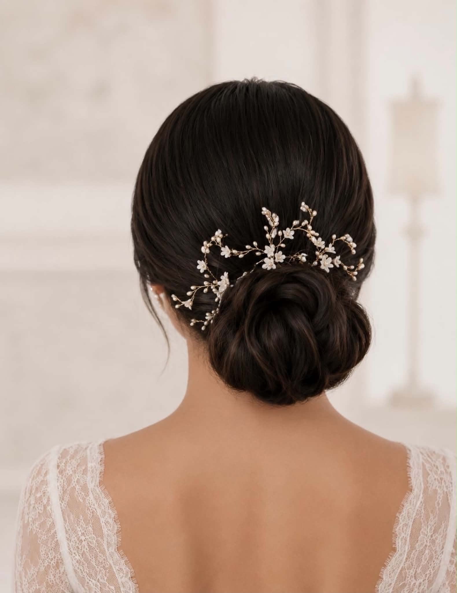 Spring floral bridal hair pins styled in a romantic wedding hairstyle