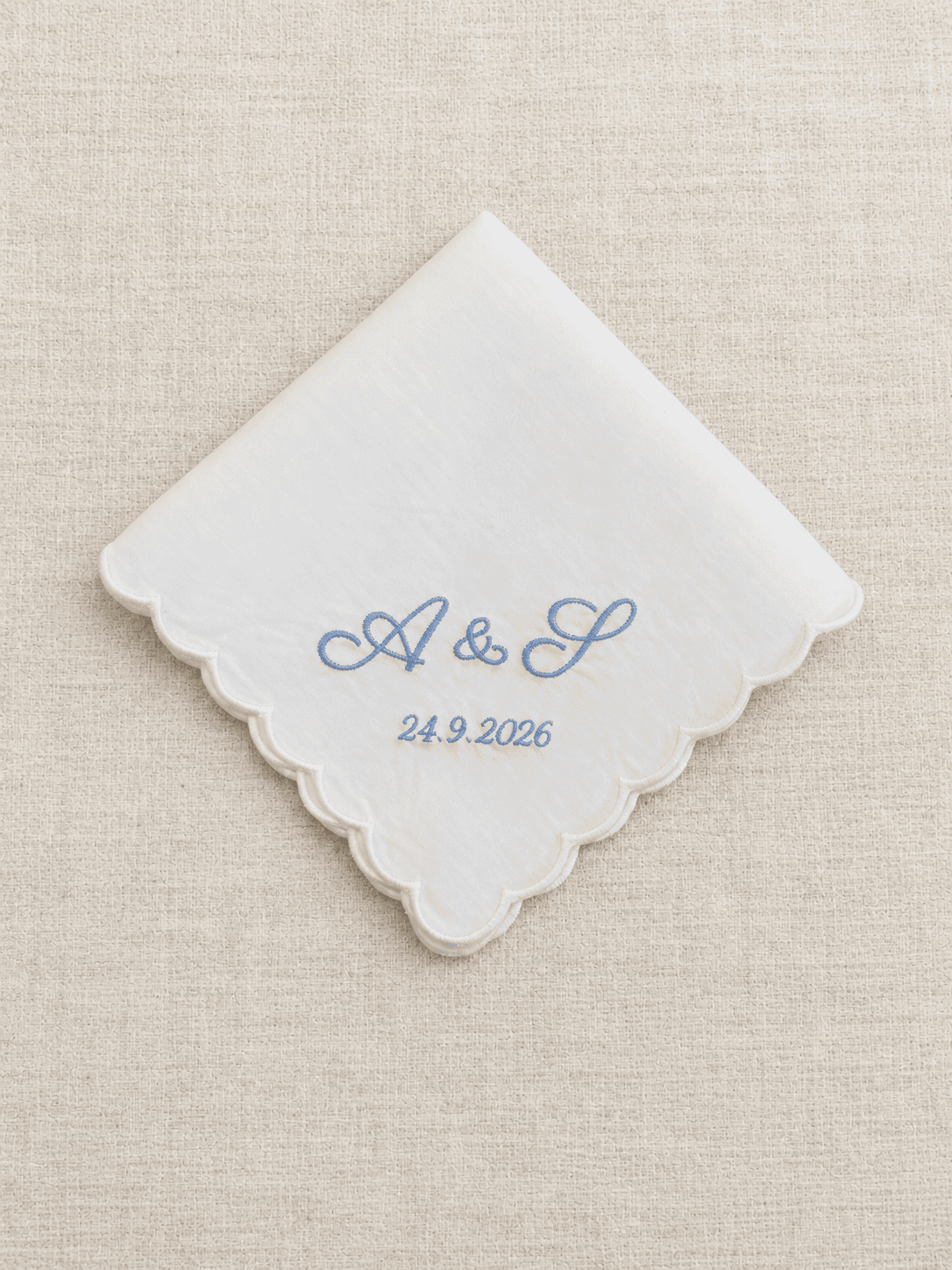 personalised cotton wedding handkerchief with elegant scalloped edge, font in light blue